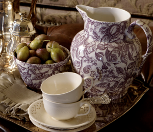 Tea cups and jug on tray.png